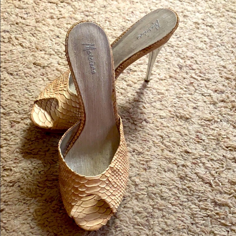 Snakeskin mules by Marciano very high